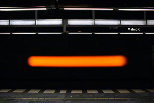 M825 – The Tale of the Malmö Central Station Orange Light Trail in the Southern Province of Scania